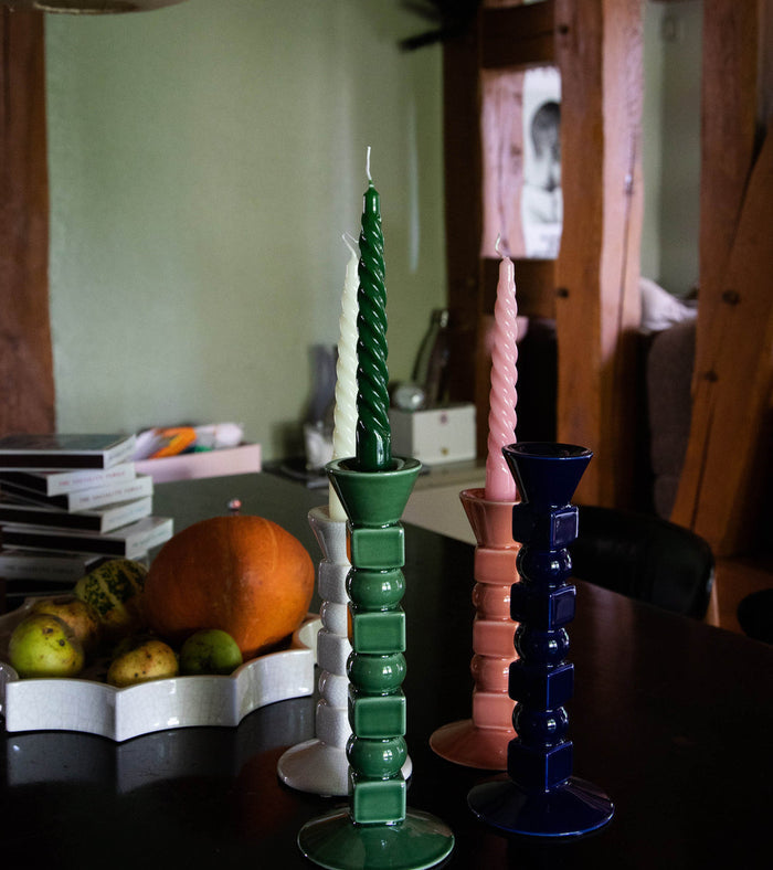 The Socialite Family Anna ceramic candle holder in powder rose, 20cm, styled in a room setting 2