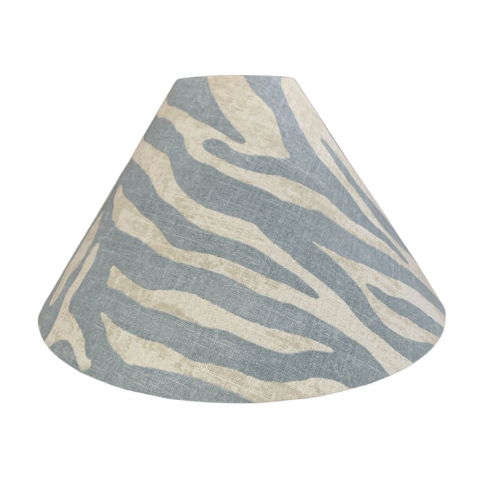 Lampshade with blue and white zebra pattern on a white background