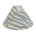 Lampshade with blue and white zebra pattern on a white background