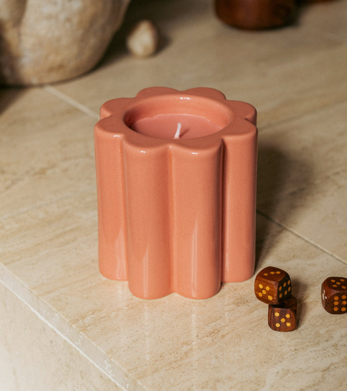 The Socialite Family Candela fig tree scented candle in a powder pink ceramic vessel, 240g, styled in a room setting 3