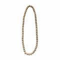 Necklace with beige wooden beads on a white background