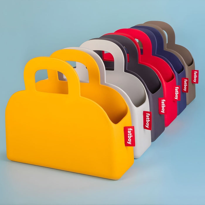 Fatboy Sjopper Kees Tote Bags in different colours on a gradient background